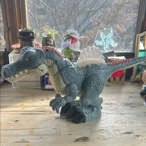 Gray and Red Dinosaur Toy